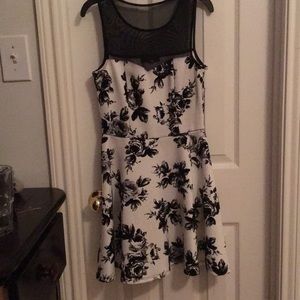 This is a cute dress, worn good with black shoes